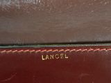 an image of a brown bag with a name on it