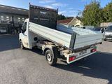 a white truck that is parked in the parking lot