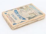 an old book with a picture of a woman on it