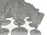 a lot of empty wine glasses on the table
