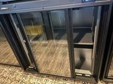 an image of a commercial refrigerator with glass doors