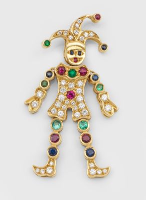 une broche en forme de clown en or et diamants, ornée de pierres multicolores