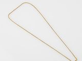 a gold necklace with a long chain that has a small square pendant on it