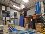a large warehouse filled with lots of different types of equipment