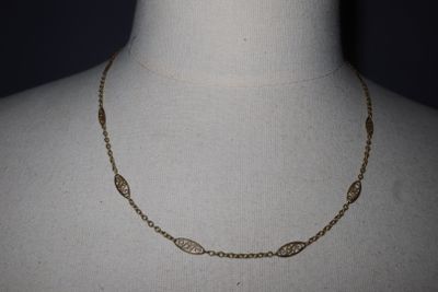 a close up of a necklace on a mannequin mannequin mannequin mannequin mannequin mannequin mannequin mannequin
