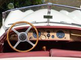 a close up of a steering wheel and dashboard of a car