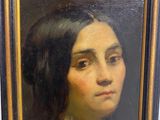 painting of a woman with long black hair in a black and gold frame