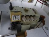 a sewing machine that is sitting on a table