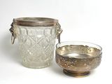a glass jar and a bowl sitting next to each other