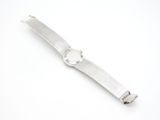 a close up of a watch on a white surface with a white background