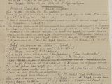 a piece of paper with writing on it sitting on a table