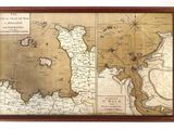 une vieille carte de la ville de New York dans un cadre en bois