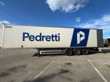 a semi truck that is parked in a parking lot