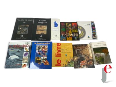 many books that are sitting on a table