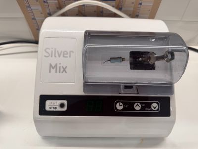 a blender sitting on top of a counter next to a box