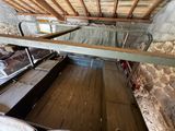 une photo d'une pièce où l'on voit beaucoup de parquet