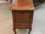 an image of a wooden desk in a room