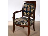 an image of a chair with a floral upholstered seat