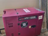 une machine rouge qui se trouve dans un garage