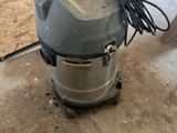 an image of a wet dryer sitting on the floor