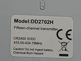 a close up of a cell phone with a label on it
