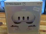 a box that is sitting on a table with a pair of headphones in it