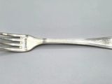 a fork that is sitting on a table