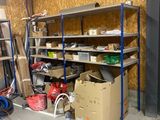 a room that has a lot of shelves and boxes in it