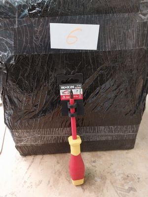 a black bag with a red handle next to a black bag with a red handle