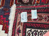 a close up of a rug with a tag on it