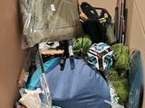 a box full of luggage and other items in it