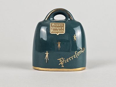 une clochette bleue ornée d'une bordure dorée et d'une étoile