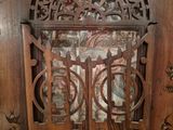 a wooden door that has a decorative design on it