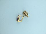 pair of gold earrings with blue stones on a white surface
