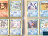 several pokemon cards are lined up in a row on a table