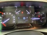 a close up of a car dashboard with various gauges