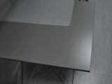 a small table with a chair next to it