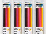 four different colored pencils in a package on a white surface
