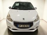 a white car that is parked in a white room