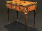 an image of a small table with a drawer on it