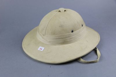 tan safari hat on grey background with a tag on the side of the hat