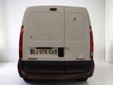 a white van that is parked in a white room