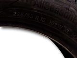 a close up of a tire on a white background