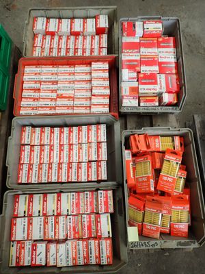 boxes of cigarettes are stacked on top of each other on the floor