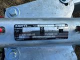 a close up of a metal device on the ground