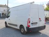 a white van that is parked in a parking lot