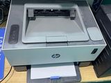 a printer that is sitting on top of a desk