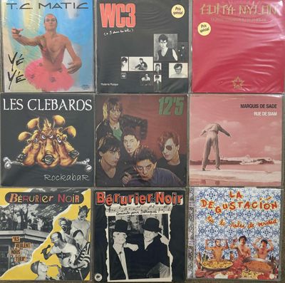 many different album covers on the wall of this room