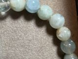 a picture of a bracelet with a glass ball on it