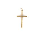 pendentif en forme de croix en or sur fond blanc
